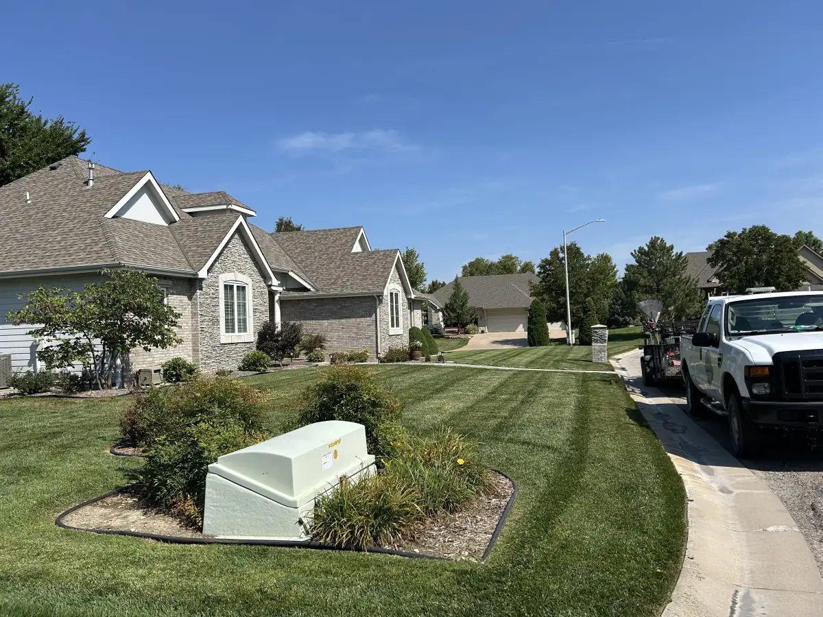 Wichita neighborhood lawn maintained with regular lawn care service